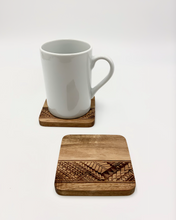 Load image into Gallery viewer, 3.5" Tribal Engraved Acacia Wood Coasters v1 (Square, Set of 2)