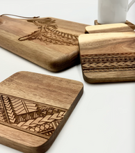 Load image into Gallery viewer, 3.5" Tribal Engraved Acacia Wood Coasters v1 (Square, Set of 2)
