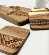 Load image into Gallery viewer, 3.5&quot; Tribal Engraved Acacia Wood Coasters v1 (Square, Set of 2)
